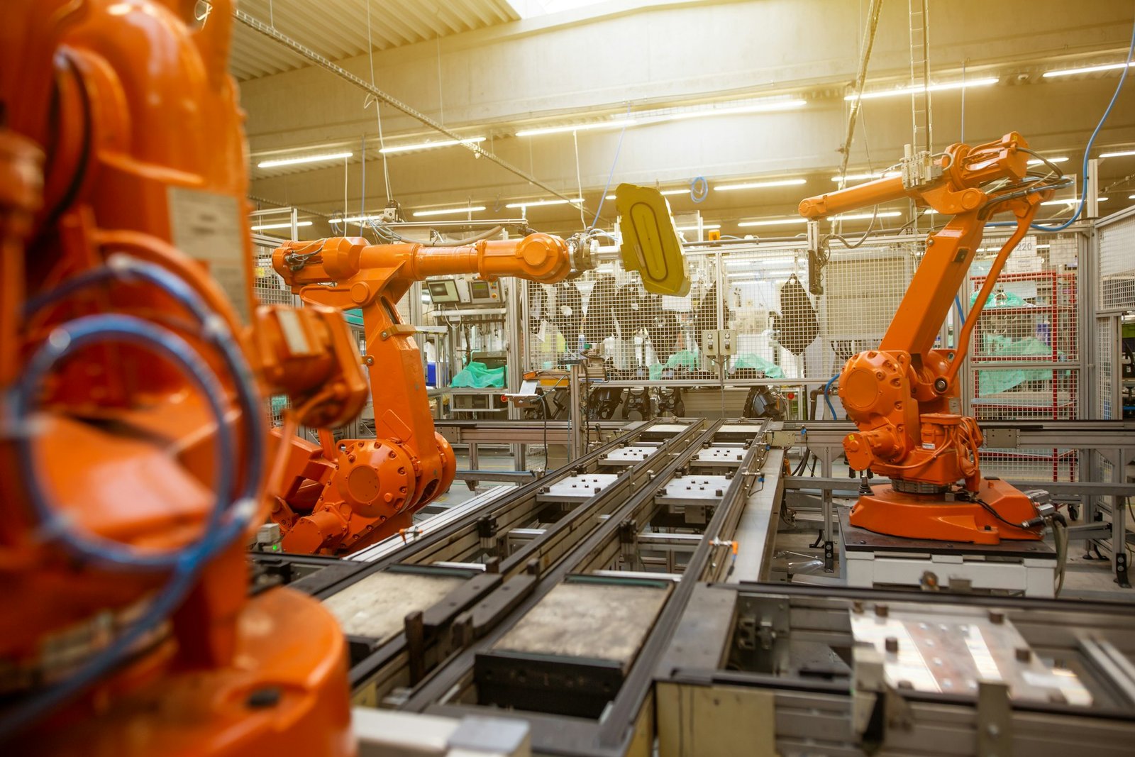 Robotic arms working on an automated production line